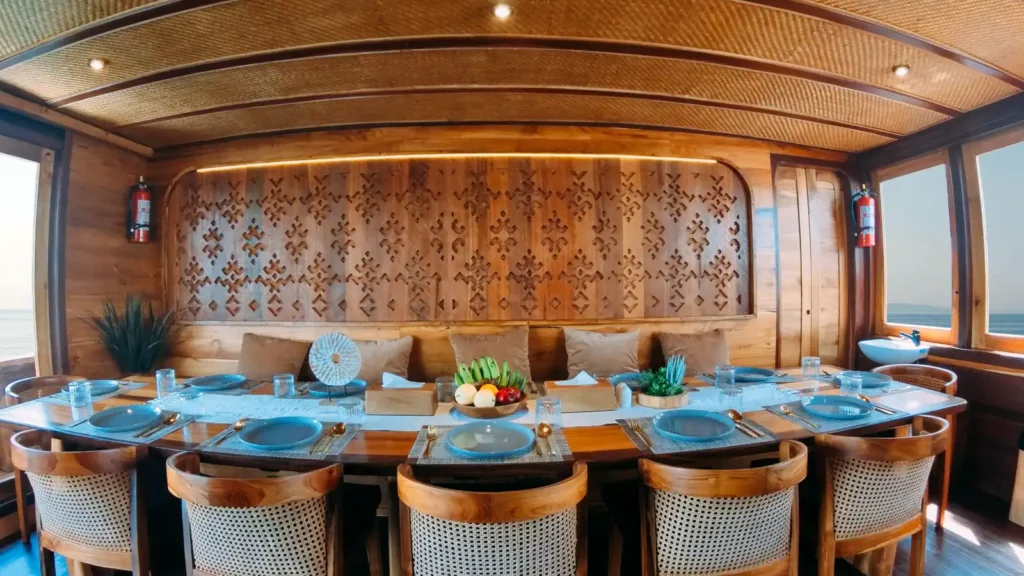 Dining area on board the Angelica phinisi liveaboard in Komodo
