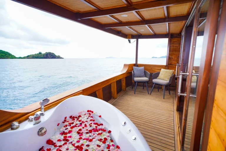 Private jacuzzi and balcony of the Paris master cabin aboard LaMain Voyage I