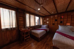 Twin bed cabin on the upper deck of Neomi Cruise
