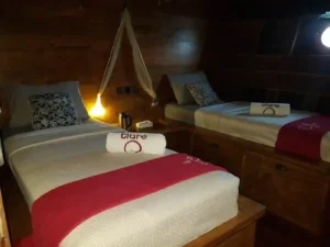 Air-conditioned triple cabin aboard Tiare Cruise