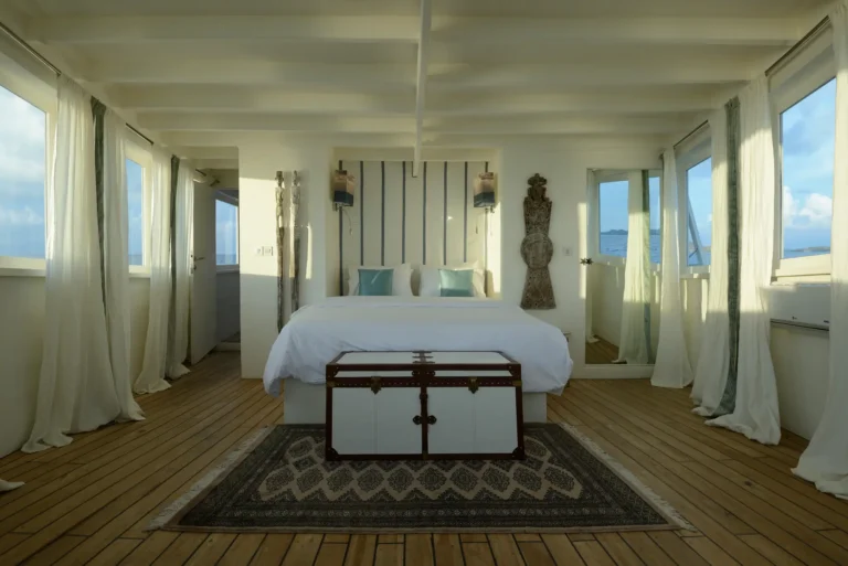 Alexa's single master suite with wraparound windows