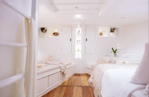 Queen bed in the Asmat family cabin in the bow of Aliikai Voyage