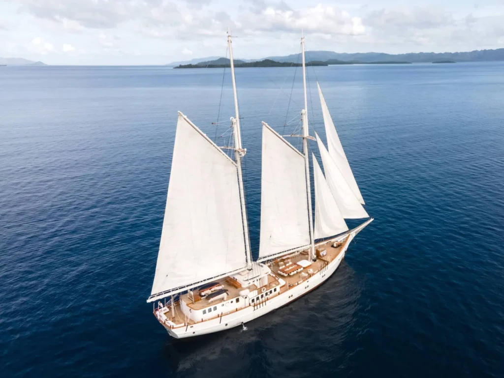 Aerial view of the Aliikai Voyage phinisi at anchor
