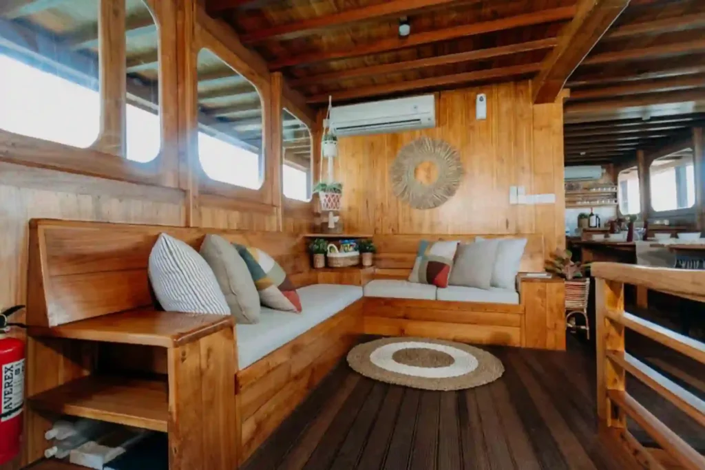 Indoor dining and lounge area aboard Andamari