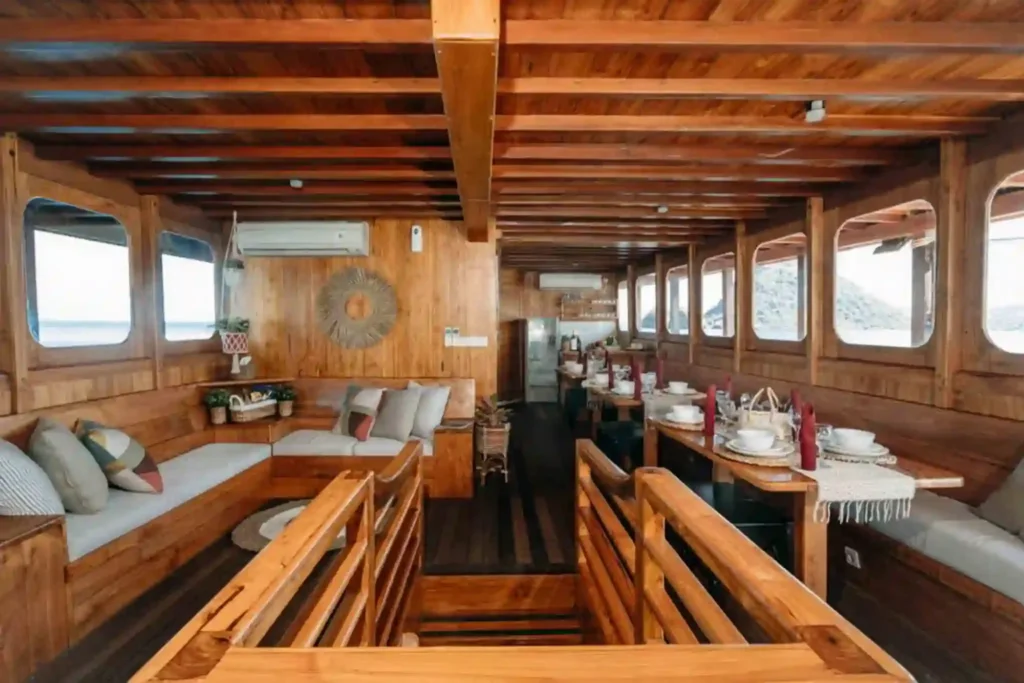 Second view of the indoor dining and lounge aboard Andamari