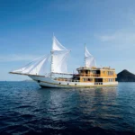 Side profile of Barakati Cruise phinisi in Komodo waters