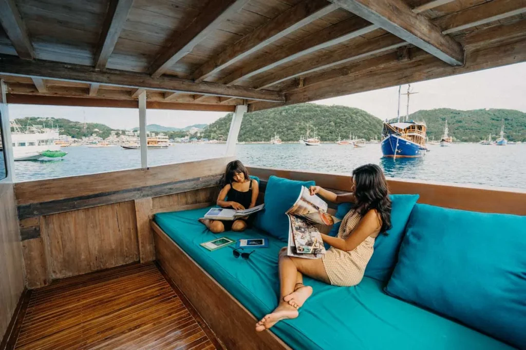 Outdoor deck seating aboard Cajoma IV phinisi