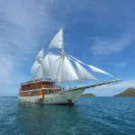 Elrora, a 33.89-metre ironwood phinisi built in 2024, sailing in Komodo National Park