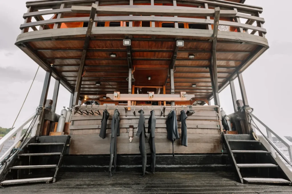 Dive deck with gear stations aboard La Galigo