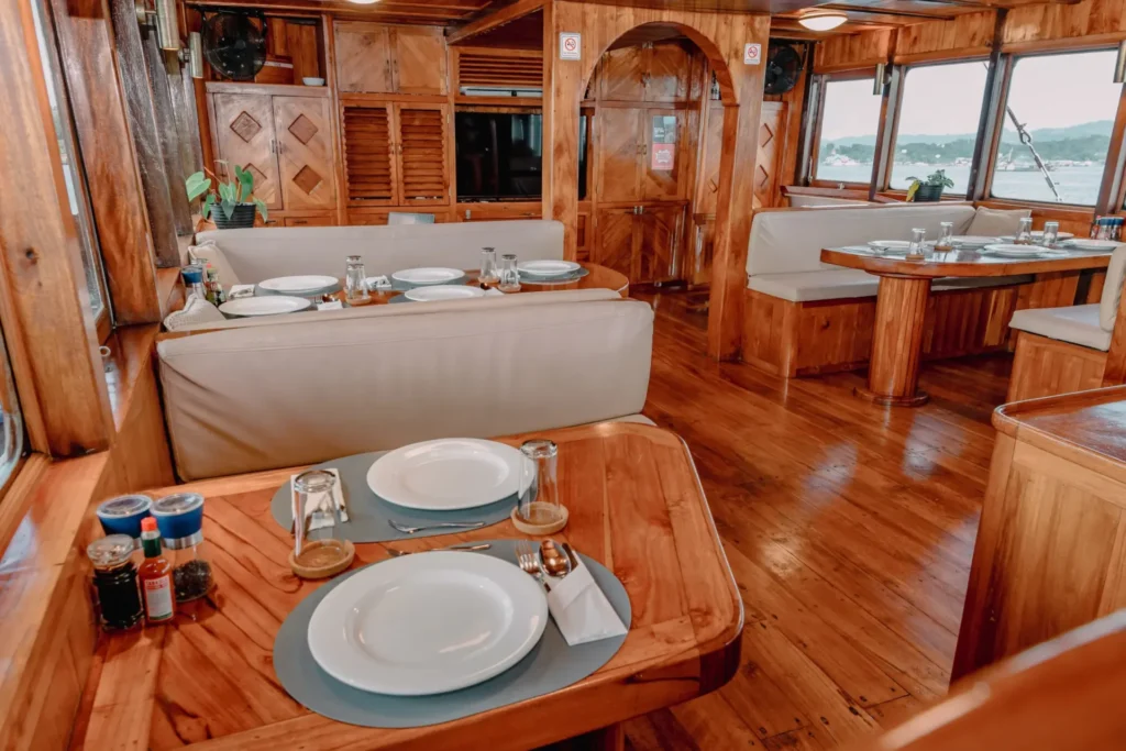 Indoor restaurant and lounge aboard La Galigo