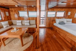Private lounge and bed in the La Galigo Suite