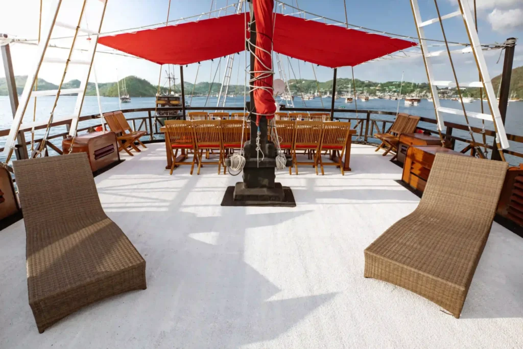 Sun lounges on the roof-top deck of La Galigo
