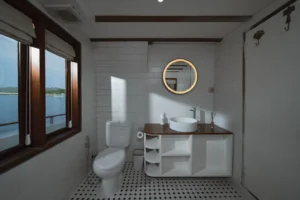 Ensuite bathroom in the Santorini master cabin aboard Le Costa