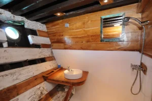 En-suite bathroom with hot shower in Double Cabin 1 aboard Moana Cruising