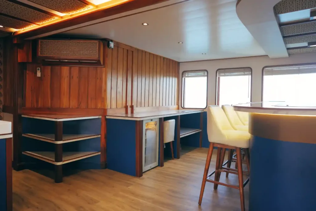 Air-conditioned indoor lounge aboard Nayara Cruise