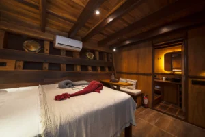 Ta’Talasa Dayak Cabin queen bed, ensuite entrance and air conditioning