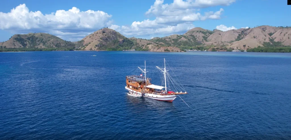Aerial exterior view of Andalucia II with Komodo hills behind