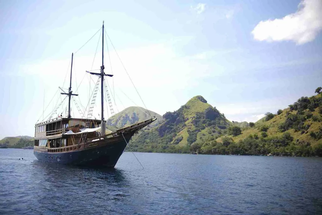 Augustine Phinisi viewed under sail near the islands of Komodo National Park