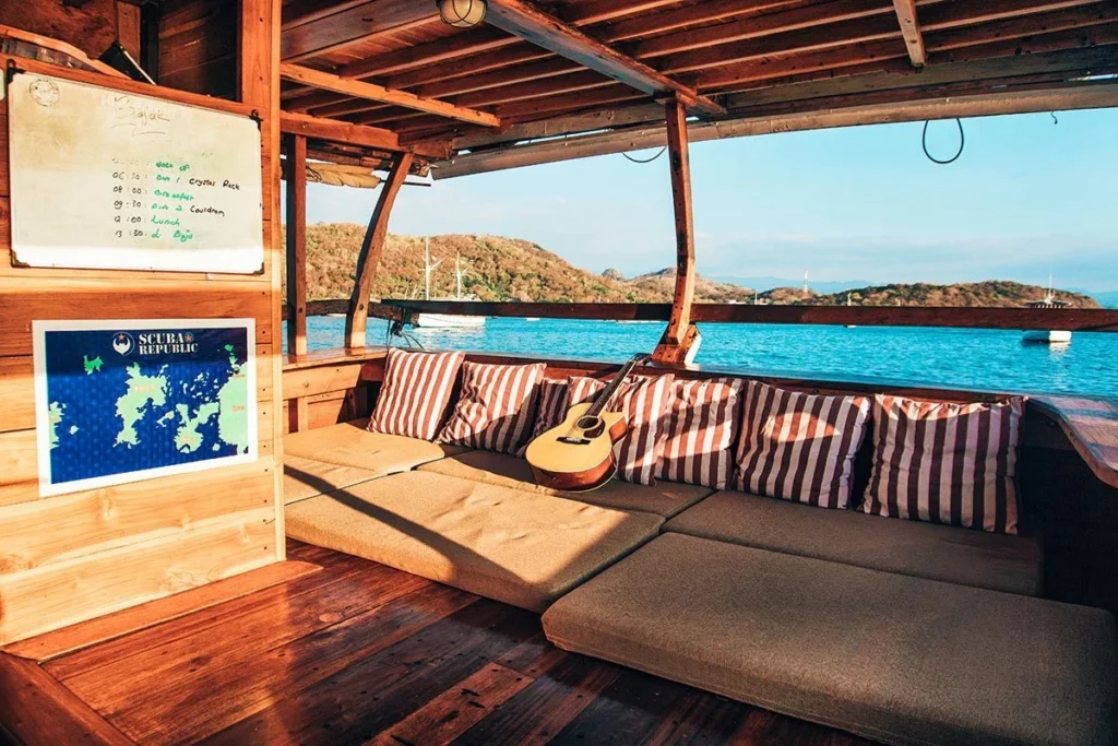 Covered lounge and dining area aboard Bajak