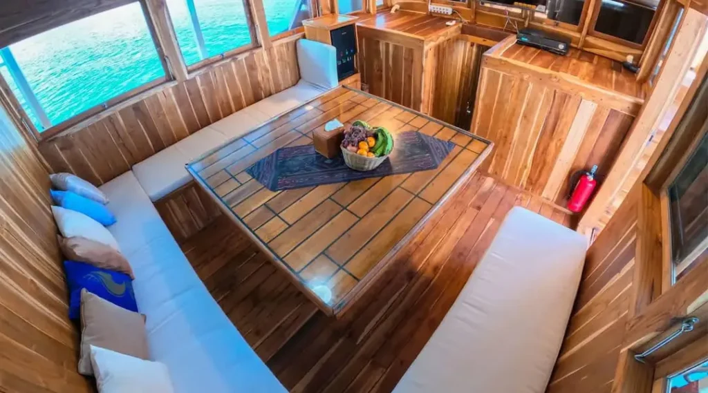 Indoor restaurant and karaoke lounge aboard Devita R Cruise