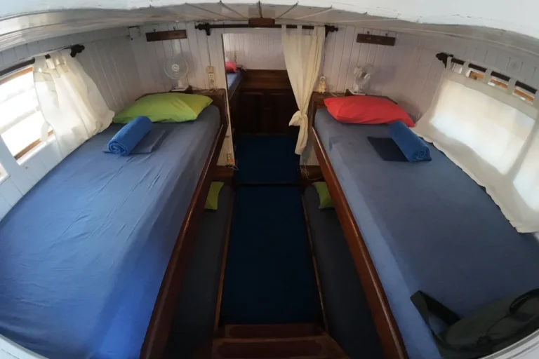 Bunk beds in the shared dorm cabin aboard Sokaraja