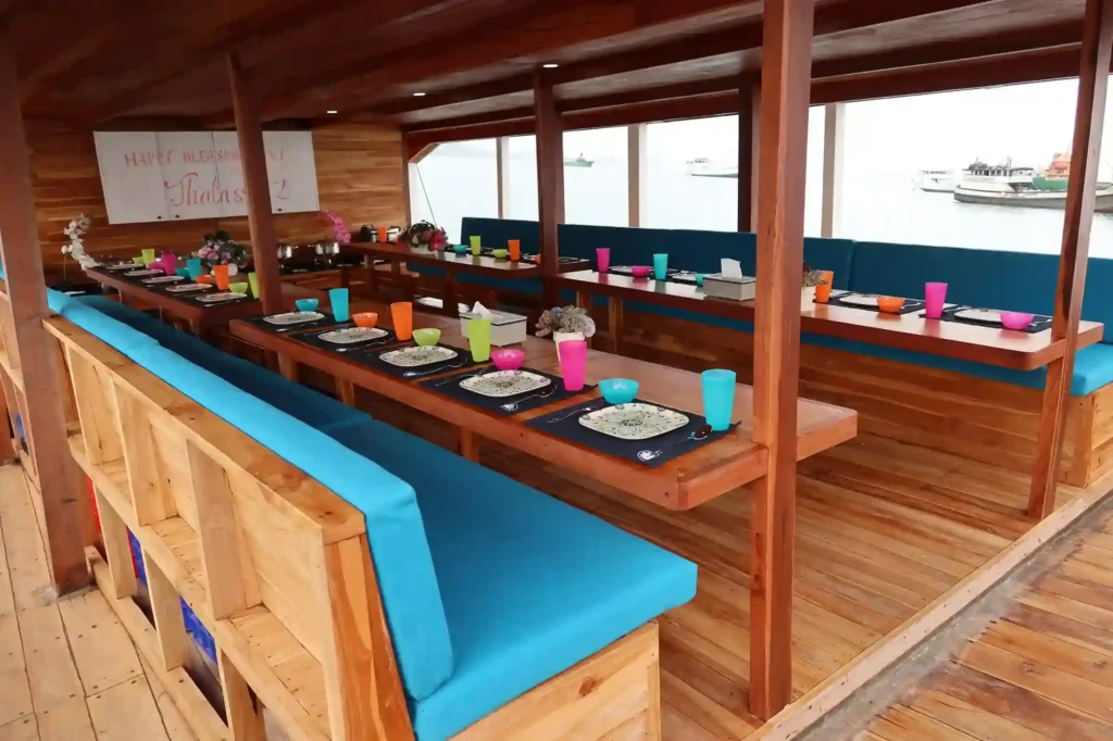 Outdoor dining area aboard Thalassa 2