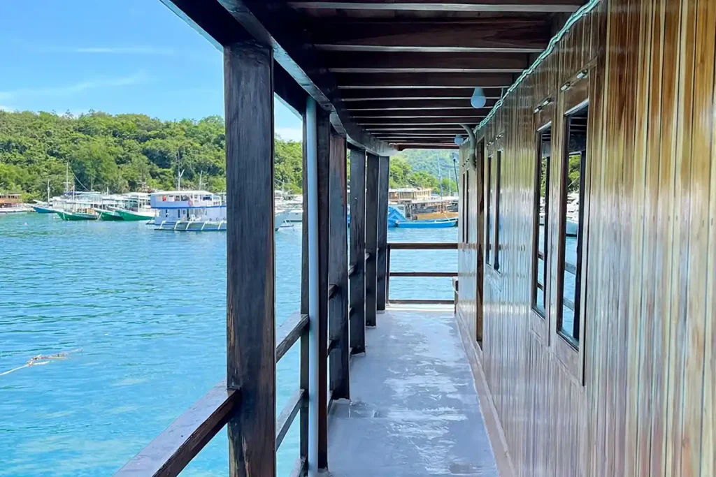 Wooden cabin hallway aboard Zada Hela