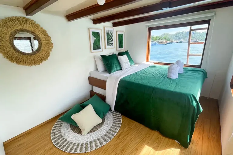 Ocean-view master bedroom aboard Zada Hela
